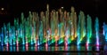 A colored fountain with illumination at night. A fabulous fountain. Background.