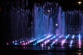 A colored fountain with illumination at night. A fabulous fountain. Background.