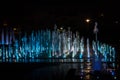 A colored fountain with illumination at night. A fabulous fountain. Background.