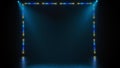 Colored frames of spot lights glowing and illuminating the empty dark theater stage. Spoted blue and yellow lights Royalty Free Stock Photo