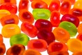Colored fruit jelly beans on white background Royalty Free Stock Photo