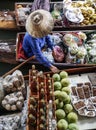 Colored fruits in floating market, fruit seller in Thailand, typical thai floating market background