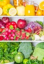 Colored full fridge with fruit and vegetables