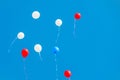 Colored gel balloons fly in the blue sky Royalty Free Stock Photo