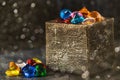 Colored gems in cube box Royalty Free Stock Photo