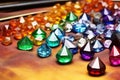 colored gemstones with polishing tools around
