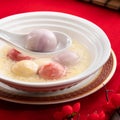 Colored glaze style big tangyuan with sweet rice wine soup and egg drop