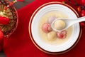 Colored glaze style big tangyuan with sweet rice wine soup and egg drop Royalty Free Stock Photo