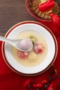 Colored glaze style big tangyuan with sweet rice wine soup and egg drop Royalty Free Stock Photo