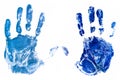 Colored hands are stamped on the paper.