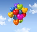 Colored heart shape balloons on a blue sky Royalty Free Stock Photo