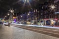 Colored homes on the water in Amsterdam at night Royalty Free Stock Photo