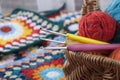 Colored hooks in a basket with threads for knitting Royalty Free Stock Photo