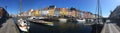 Colored houses near the water channel. Vacation in Europe. Copenhagen.