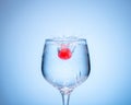 Colored ice ball droped into coctail glass . Royalty Free Stock Photo