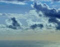 Colored image of clouds and ship on the sea at dawn Royalty Free Stock Photo