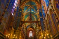 Colored interior of Church of Our Lady Assumed into Heaven is a Brick Gothic church adjacent to the Main Market Square in Krakow