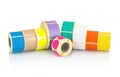 Colored label rolls isolated on white background with shadow reflection. Color reels of labels for printers. Labels for direct the Royalty Free Stock Photo