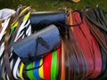 Colored leather belts and shoulder bags