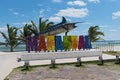 Colored lettering of tourist resort with marlin fish in Mahahual, Mexico