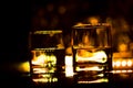 Colored lighting of glasses in the night club bar Royalty Free Stock Photo