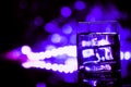 Colored lighting of glasses in the night club bar Royalty Free Stock Photo