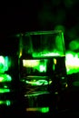 Colored lighting of glasses in the night club bar Royalty Free Stock Photo