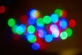 Colored lights Christmas garlands. Colorful abstract background. Blur and bokeh Royalty Free Stock Photo