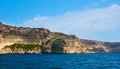 The colored limestone cliffs of Bonifacio with Grain de Sable rock formation, Corsica, France Royalty Free Stock Photo