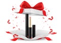 Colored Lipsticks, lip glosses inside open gift box, isolated on white background. White gift box with cosmetic items. Present,