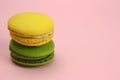 Colored macaroons or macarons on a pink background Royalty Free Stock Photo
