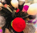 Colored make-up brushes for beauty moments. Royalty Free Stock Photo