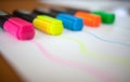 Colored markers on paper. Royalty Free Stock Photo
