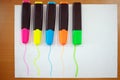 Colored markers on paper. Royalty Free Stock Photo