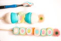 colored marshmelow, toothbrush. healthy teeth. concept of child health and morning oral hygiene. healthy dentistry or harmful nutr Royalty Free Stock Photo