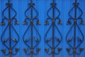 Colored metal texture of black wrought iron bars in a pattern Royalty Free Stock Photo