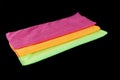 Colored microfiber cleaning cloths,blue, green, orange and pink microfiber cleaning cloths, Royalty Free Stock Photo