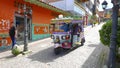 Colored mototaxi in the streets of Guatape Colombia