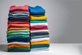 Colored multi-colored T-shirts lie in a stack. Concept of diversity in the world
