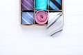 Colored neckties in basket Royalty Free Stock Photo