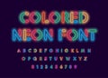 Colored neon font, colorful outlines letter and numbers set with neon colored glow on black background. Fluorescent