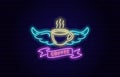 Colored neon illustration coffee cup, wings, ribbon with text on a background with bricks.