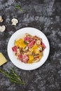 Colored papardelle with chicken, bacon and mushrooms