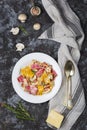 Colored papardelle with chicken, bacon and mushrooms