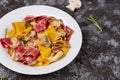 Colored papardelle with chicken, bacon and mushrooms