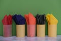 colored paper napkins in a plastic cup Royalty Free Stock Photo