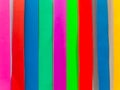 Colored paper strips decorate on board Royalty Free Stock Photo