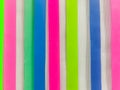 Colored paper strips decorate on board Royalty Free Stock Photo