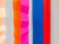 Colored paper strips decorate on board Royalty Free Stock Photo