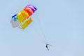 Colored parasail wing in the blue sky, Parasailing also known as parascending or parakiting